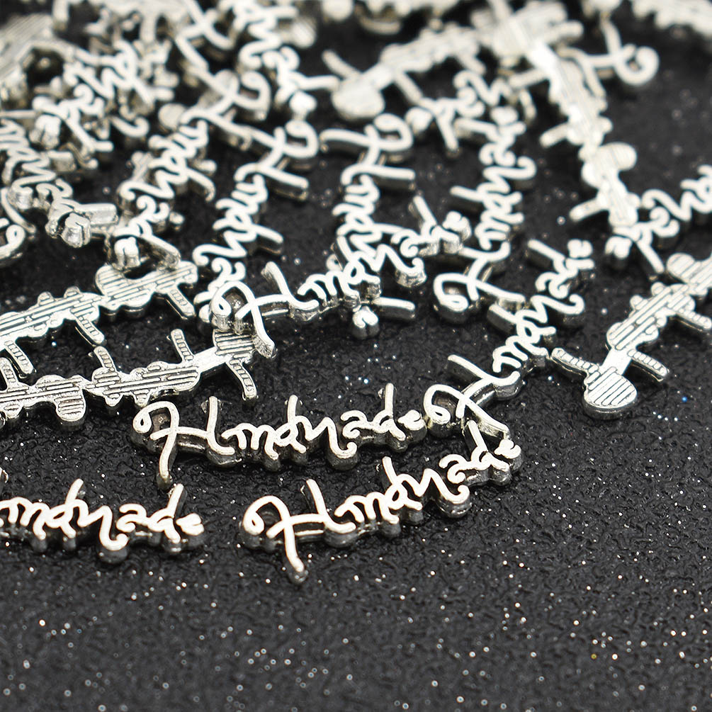 100 etiquetas de metal hechas a mano con letras impresas para suministros de artesanía de costura hágalo usted mismo - Imagen 12 de 13