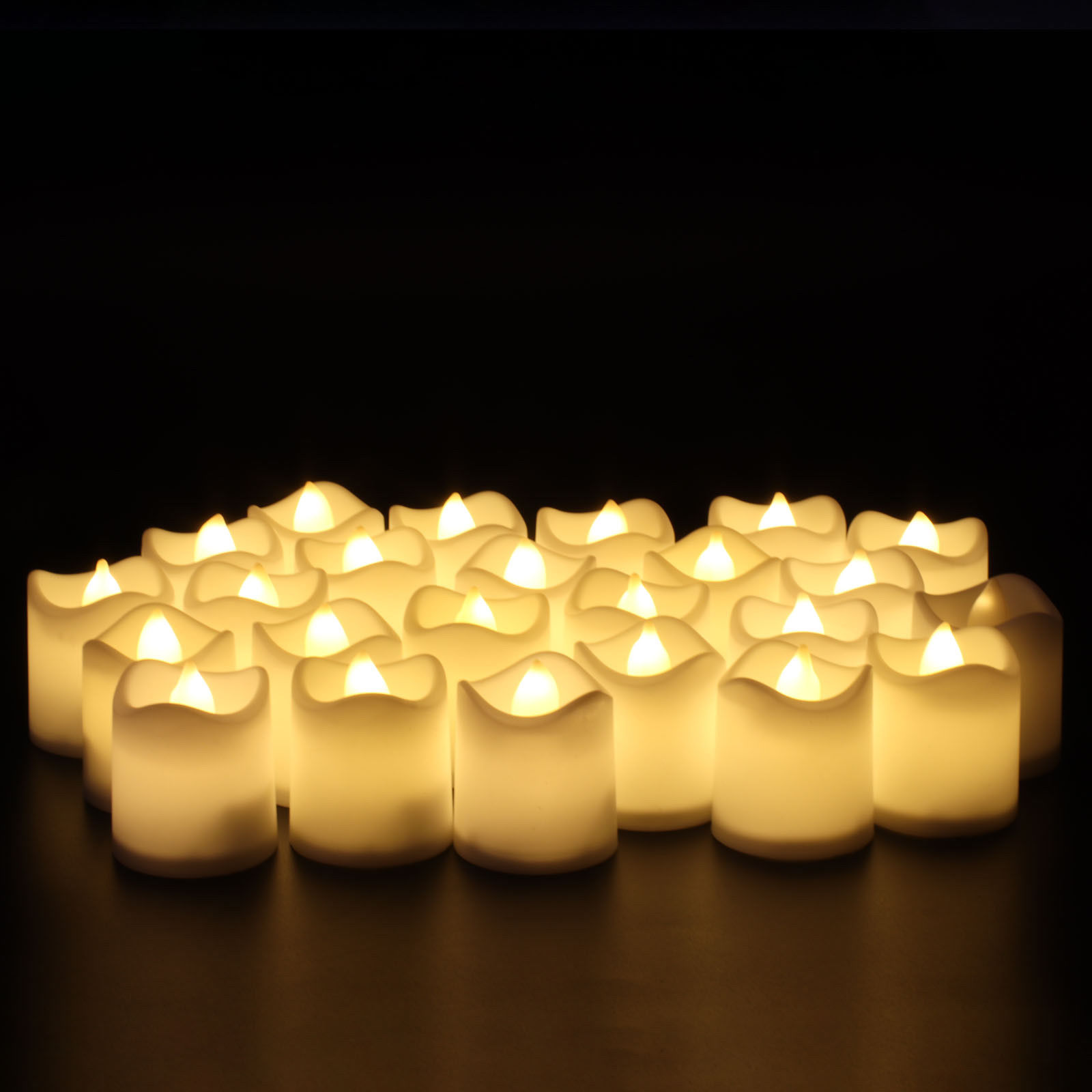 24/48/72/96PC Flameless Votive Candles Battery Operated Flickering LED Tea Light 